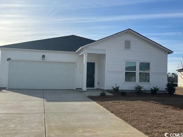 View of front facade with a garage