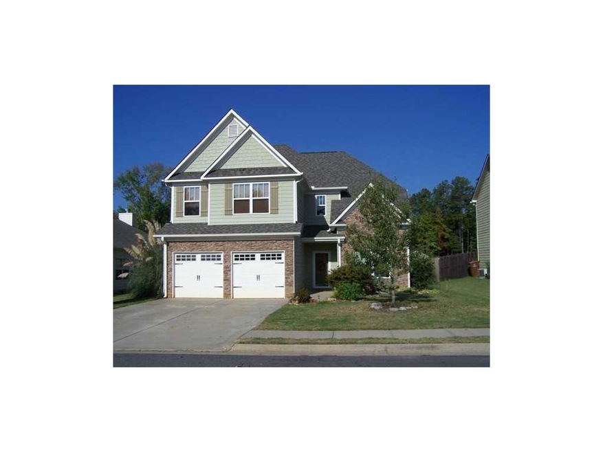 Exterior Front. ATTACTIVE STONE FRONT & LEVEL YARD