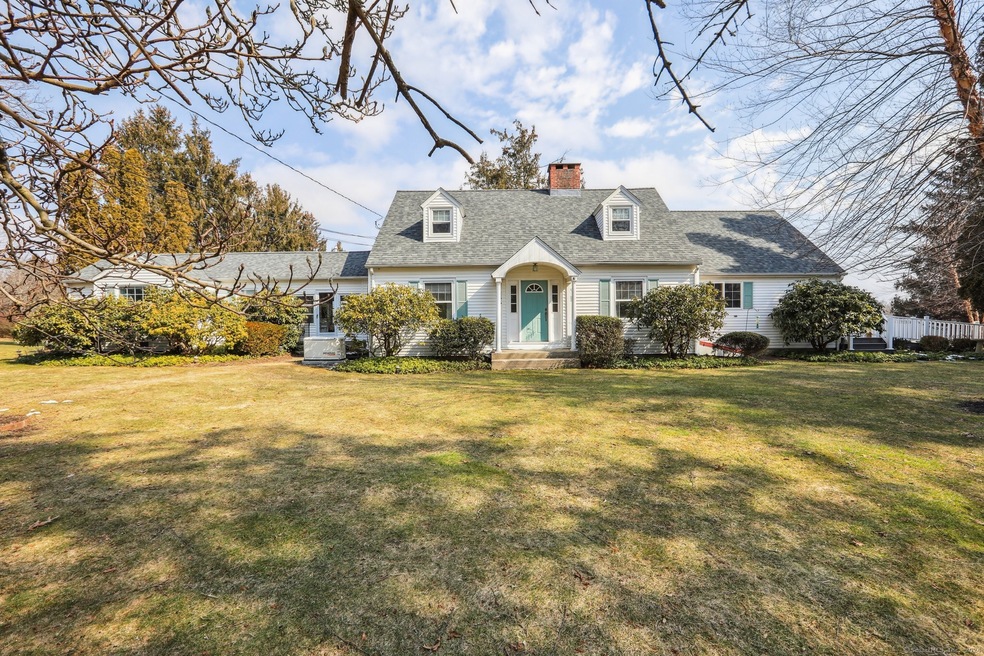 Beautiful level lot with perennial shrubs and plan