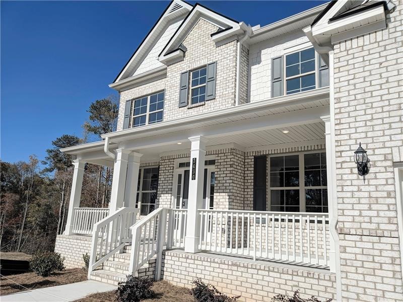Beautiful wooded basement home with full front por