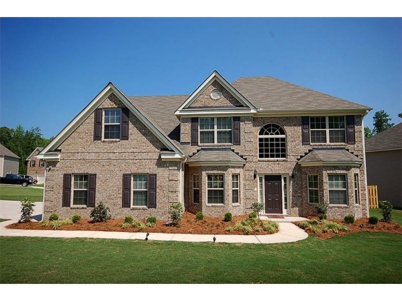 Side garage with brick front