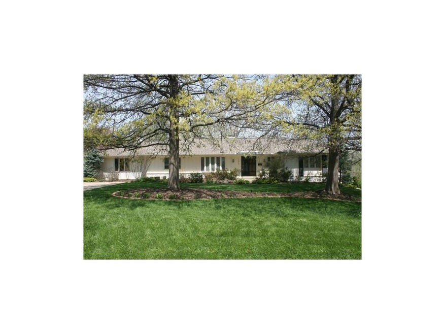 Lovely raised ranch on nearly 1 ACRE lot!