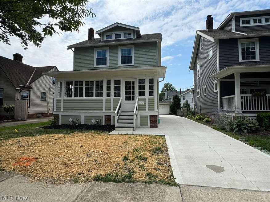 View of front of home featuring a front lawn