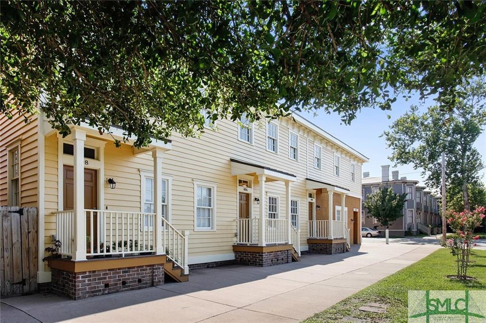 For sale is the center townhouse pictured in this 