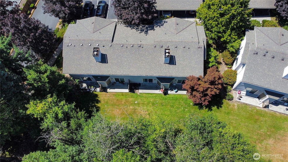 Tranquil setting with grass and trees.