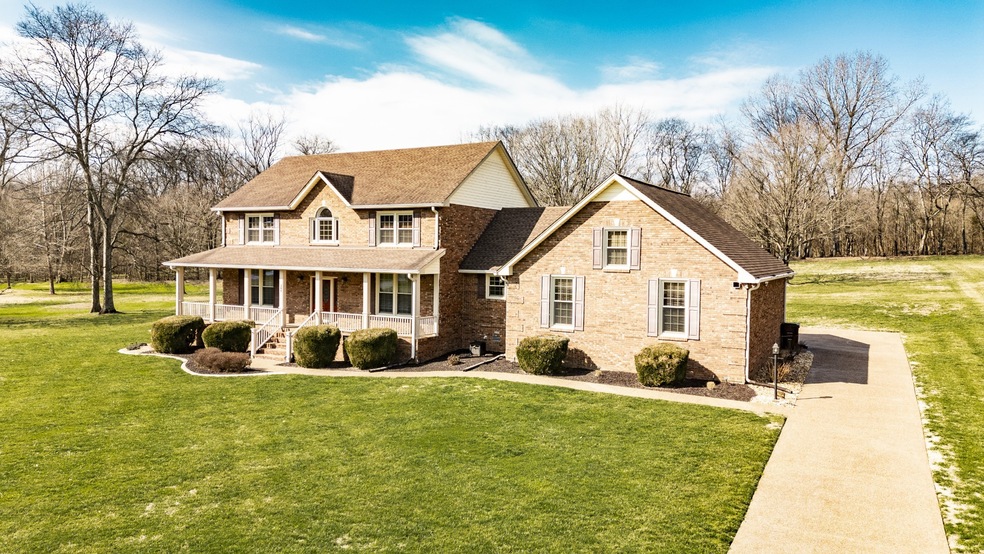 Welcome to 205 The Hollows Court! A beautiful place to call home! Meticulously landscaped setting!