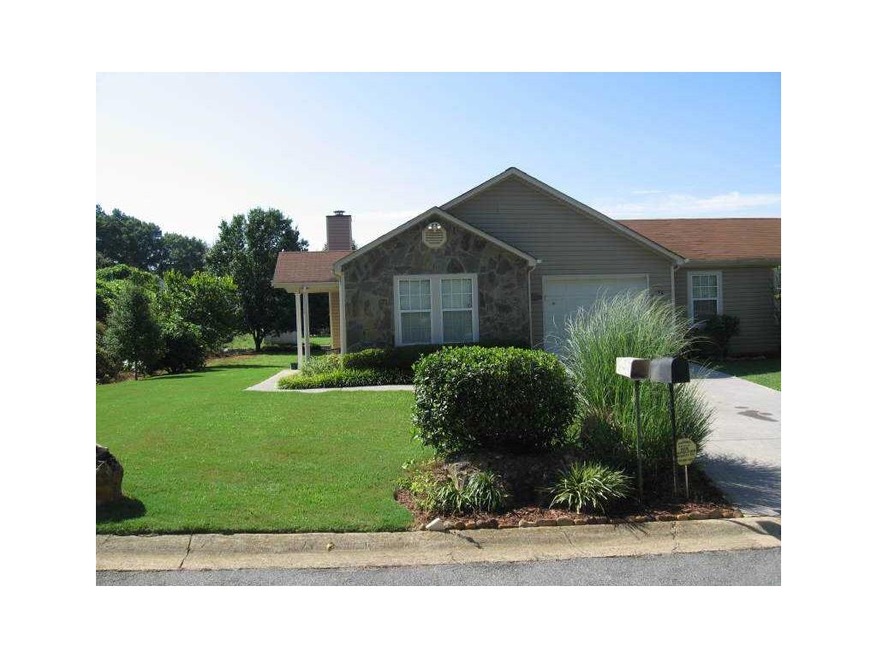 Exterior Front. Great end unit on this Garden Home