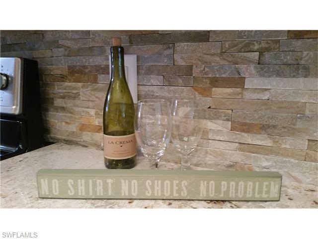 3930 Belair Ln unit 101, Naples, FL 34103 - photo 1