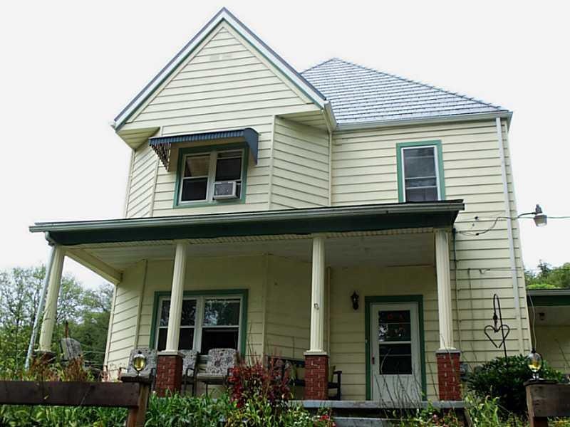 Exterior Front. Front with bay window overlooking 