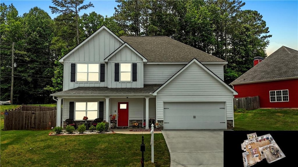 View of front facade featuring board and batten siding, covered porch, concrete driveway, a garage, and roof with shingles