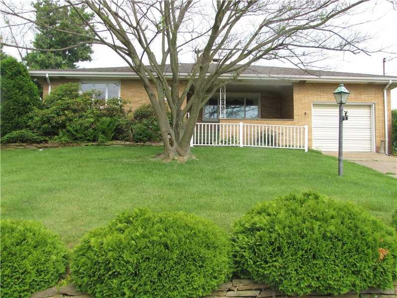 Exterior Front. Exceptionally large ranch home wit