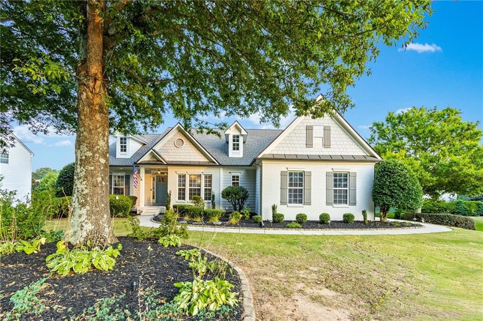 View of front of property with a front lawn