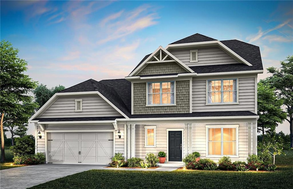 View of front facade with concrete driveway, a shingled roof, a garage, and a front lawn