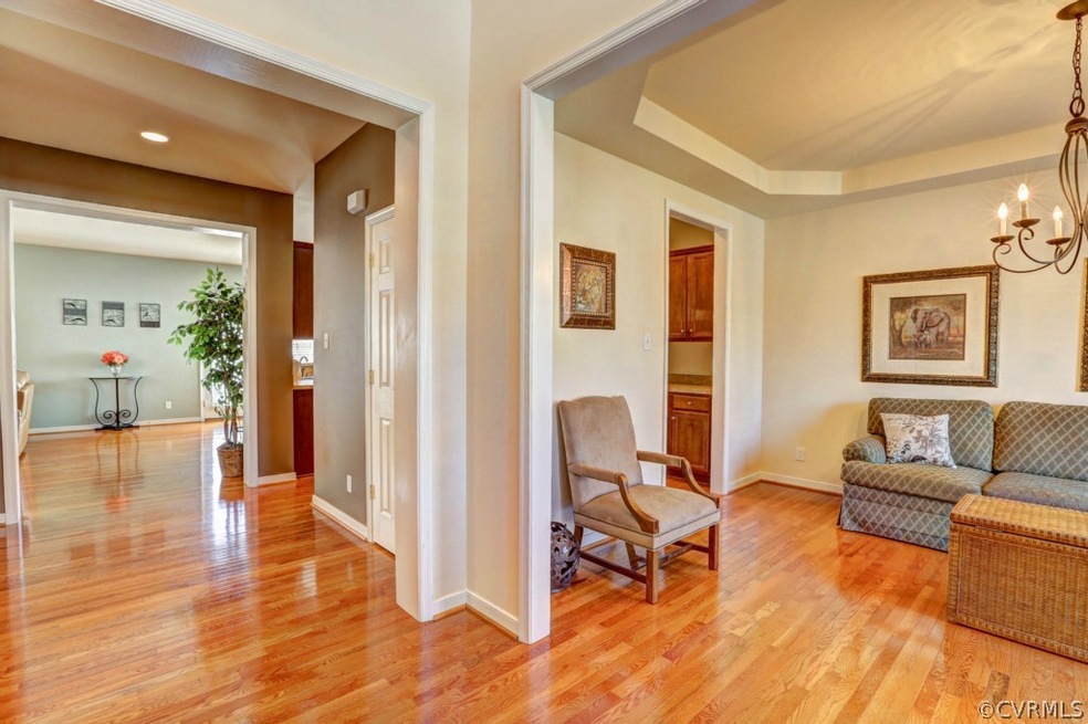 Beautiful spacious entrance with view of living ro