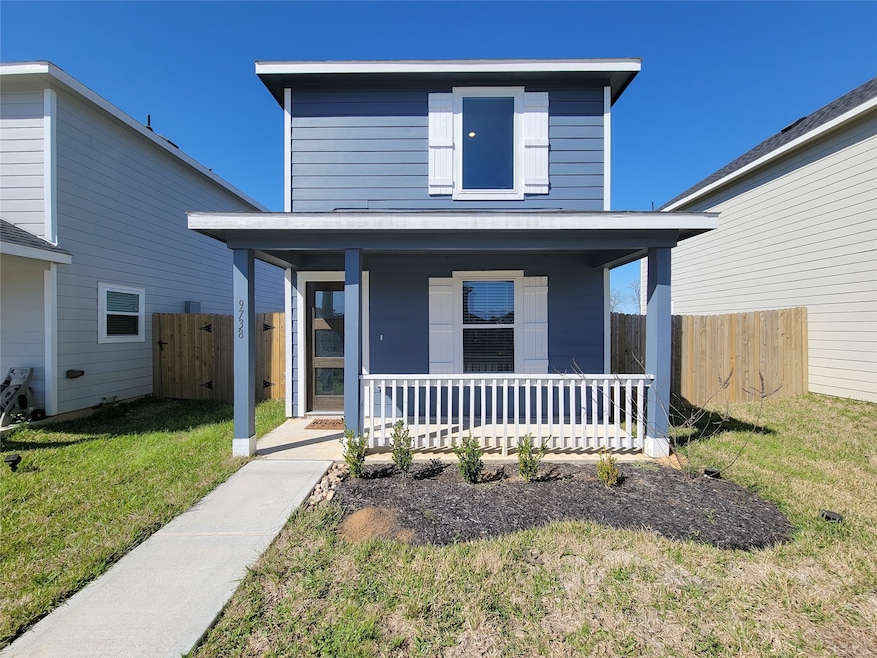 This charming two-story home features a modern blu