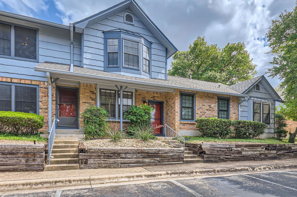 View of front of property featuring brick siding,