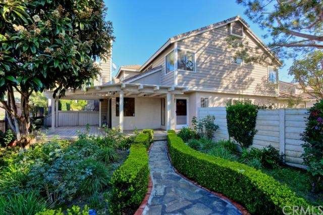 Premium gated lot with yard, rose garden and large