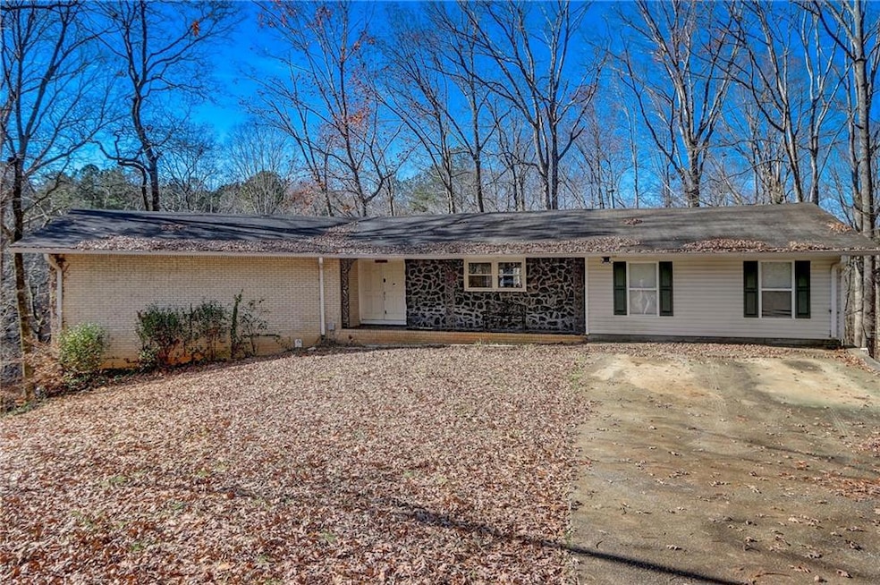 View of single story home with finished basement