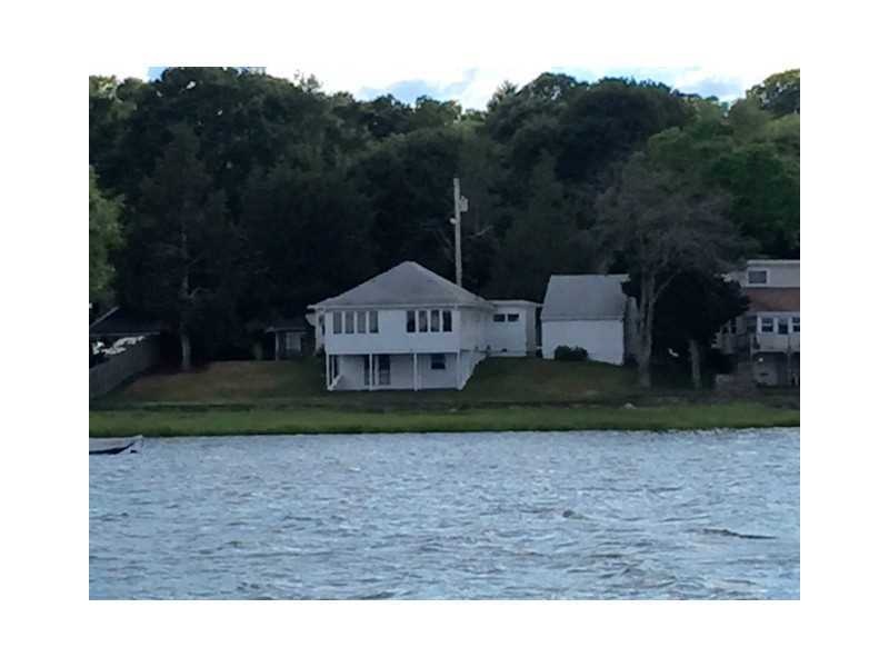 Exterior Back. Water Side of home.  100 Ft. Fronta