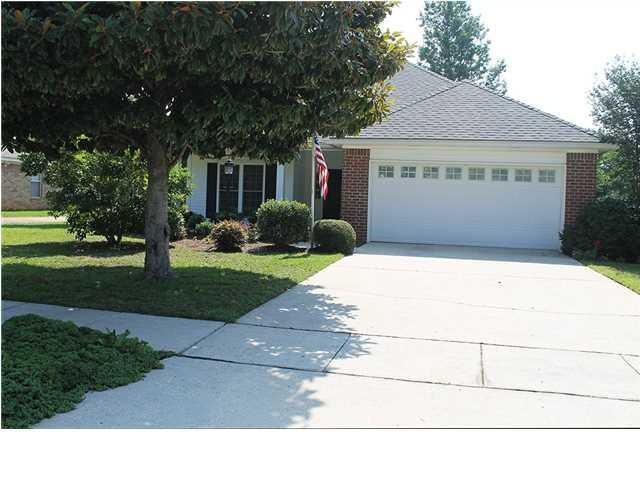 This well maintained brick home is located on a cu