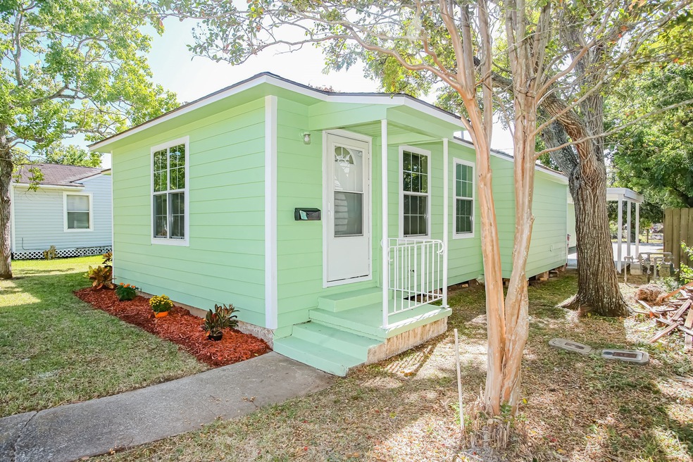 Tree shaded entry with fantastic curb appeal.