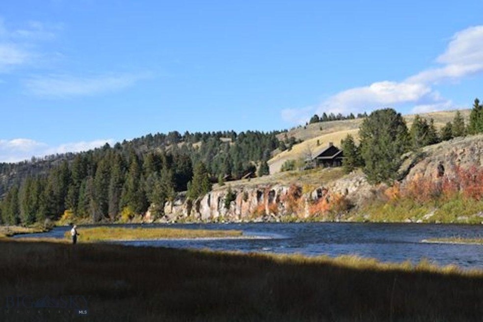 View of the property from across the river, with i