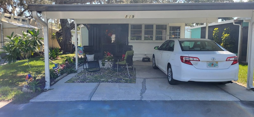 8225 Arevee Dr unit 819, New Port Richey, FL 34653 - photo 1