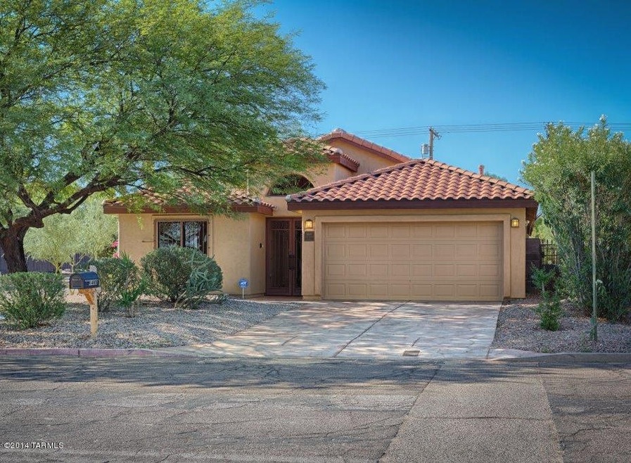 Beautiful custom iron gate, tile roof