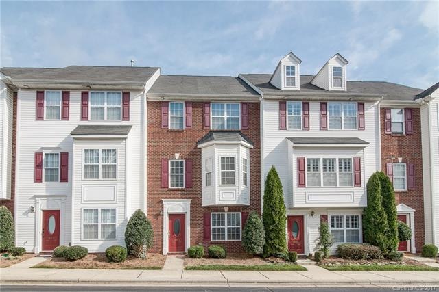 Front of the home features a gorgeous brick elevat