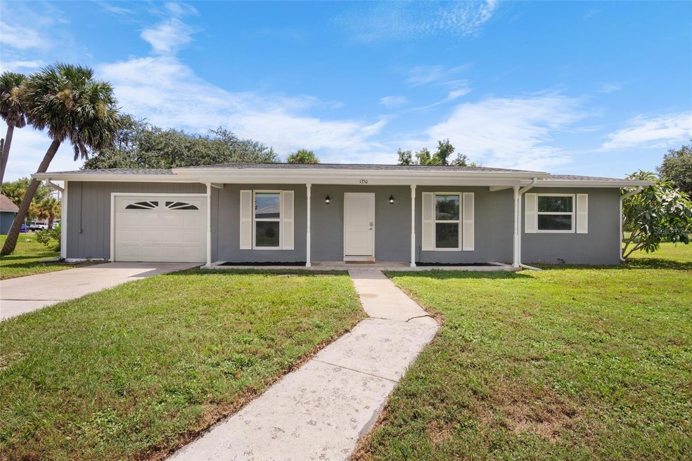 1350 Hillcrest Ave NW, Port Charlotte, FL 33948 - photo 1