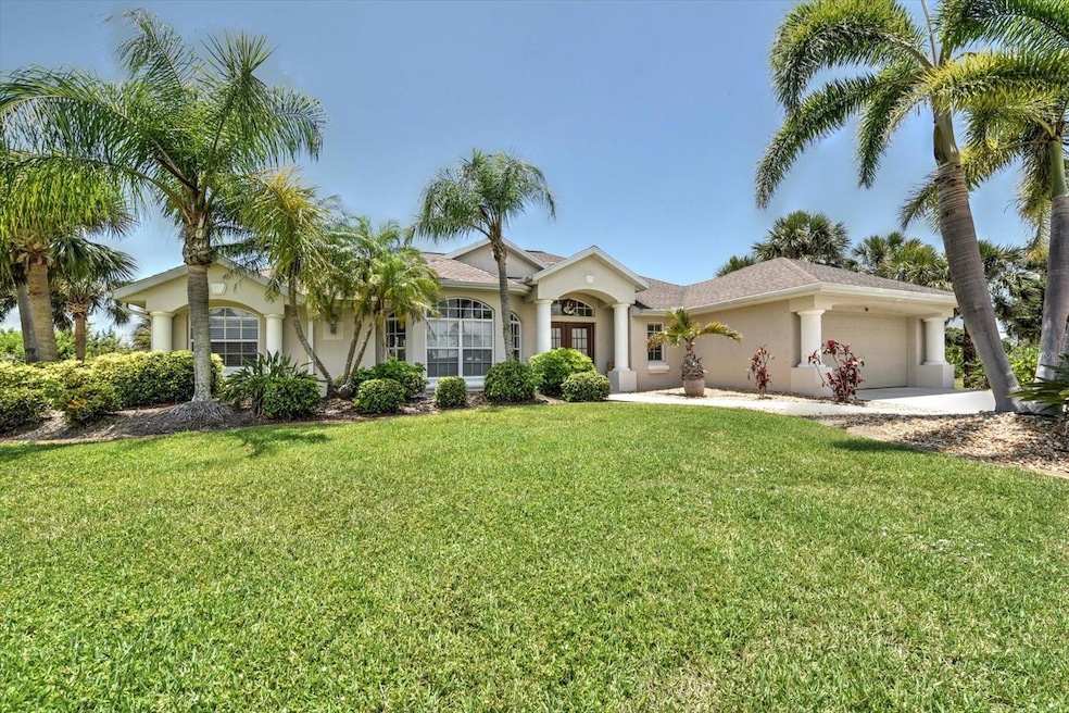 90 Long Meadow Place, Rotonda West, FL 33947 - photo 1