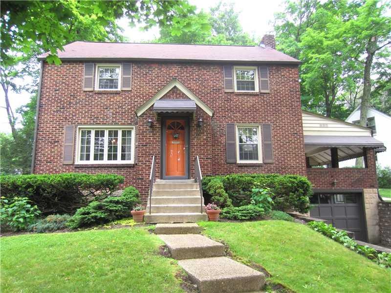 Exterior Front. Beautiful Landscaping surrounds th