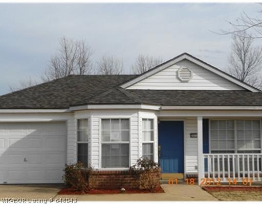 Exterior Front. Rose Bushes will bloom and welcome you to this amazing home!