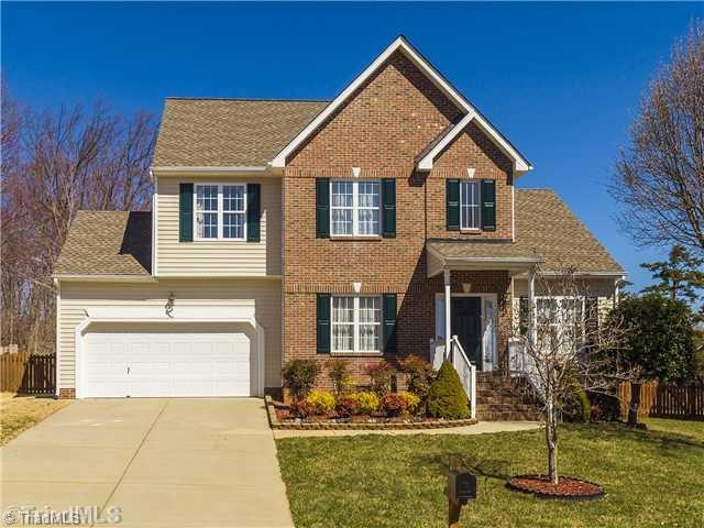 Exterior Front. Enjoy this low-maintenance brick and vinyl transitional with 2-car attached garage in The Meadows.