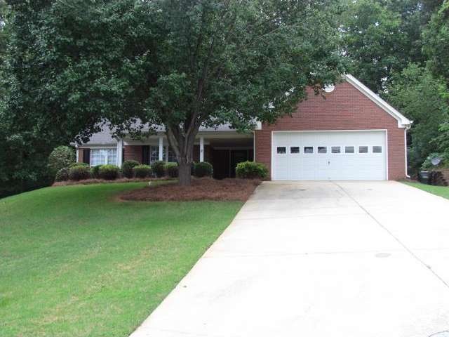 LOVELY FOUR SIDED BRICK RANCH!