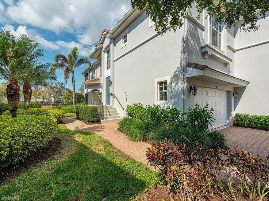 View of property exterior featuring an attached garage and stucco siding