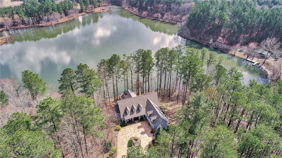 Homes sits on almost 4 private acres with gorgeous