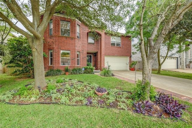 Lush landscaping with mature trees!