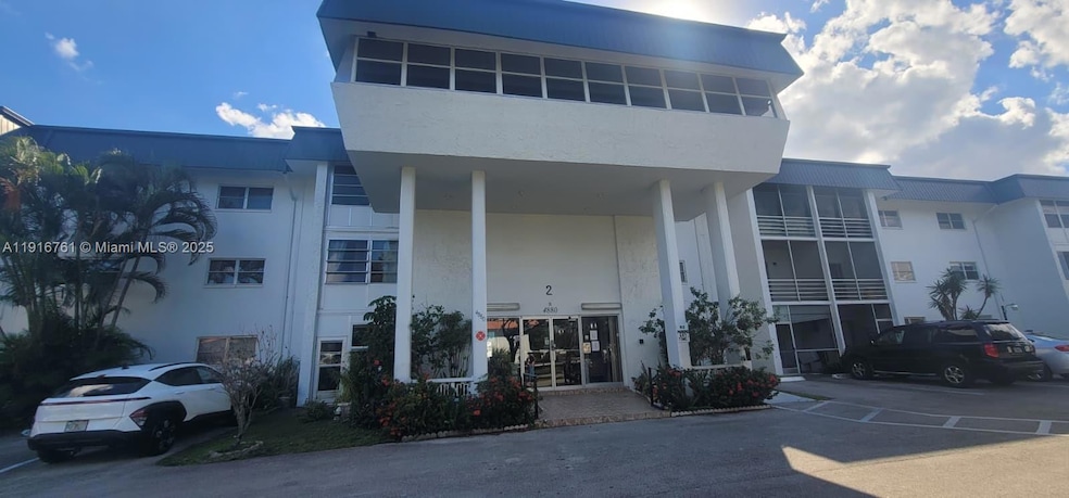 4880 NW 22nd St unit 301, Lauderhill, FL 33313 - photo 1