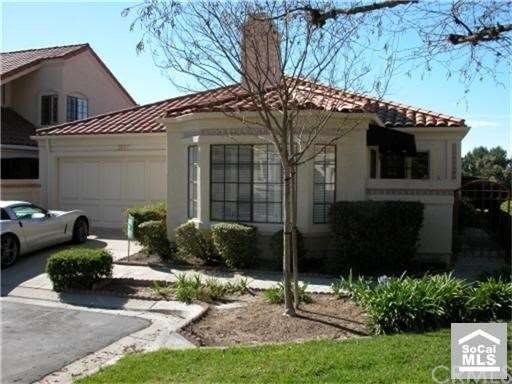 Frontage with side greenbelt.