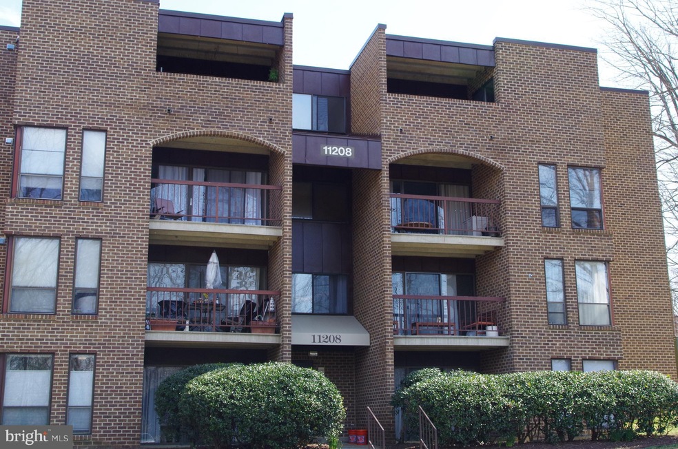11208 Chestnut Grove Square unit 310, Reston, VA 20190 - photo 1