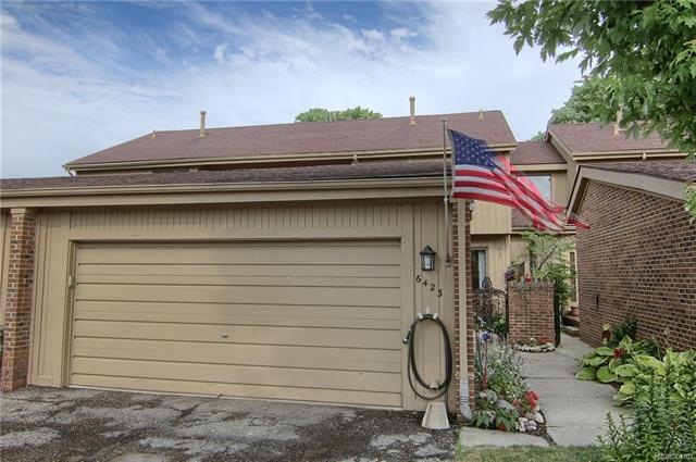 6423 Richard Run Front view with American Flag and