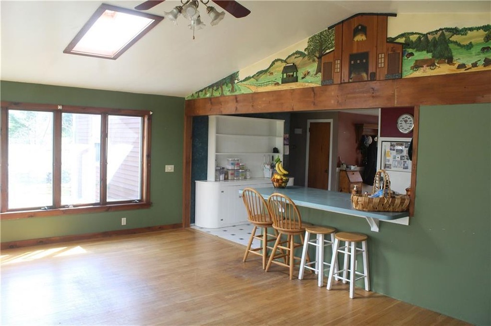 Family room/dining area with cathedral ceilings, h