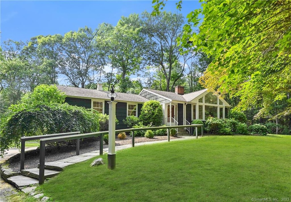 This pristine ranch style home is the perfect fusi