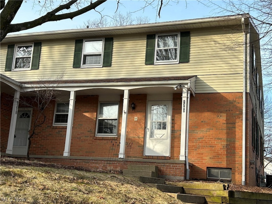 View of front of home featuring covered porch