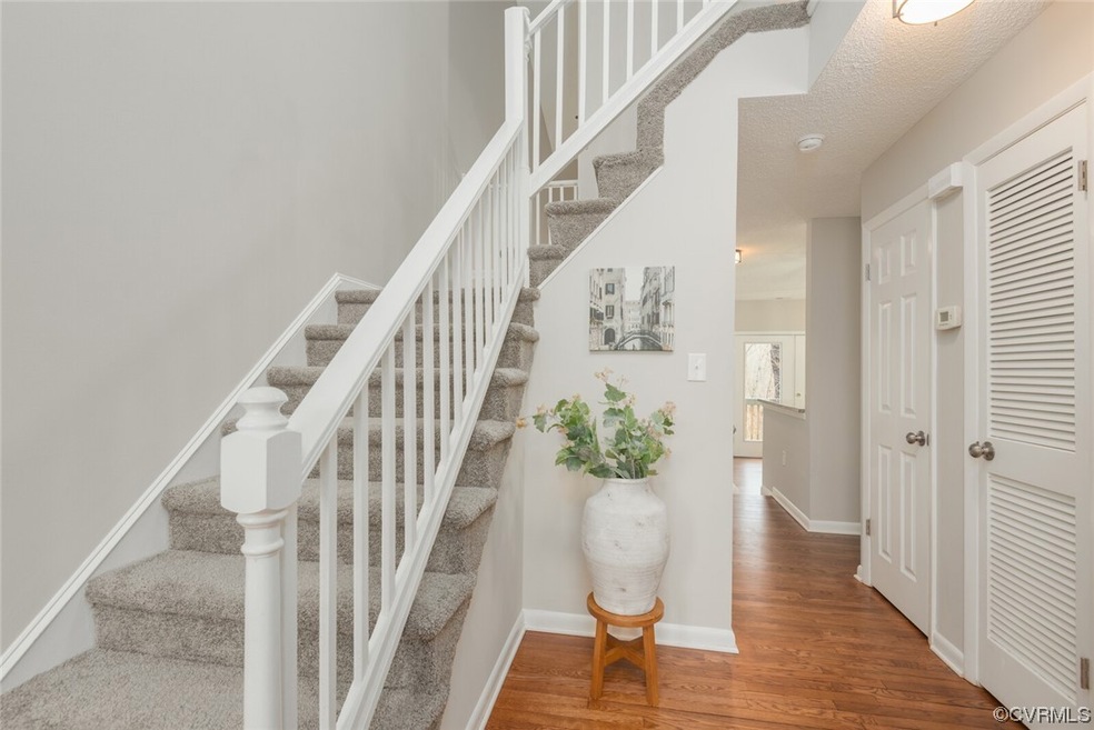 Staircase with wood-type flooring