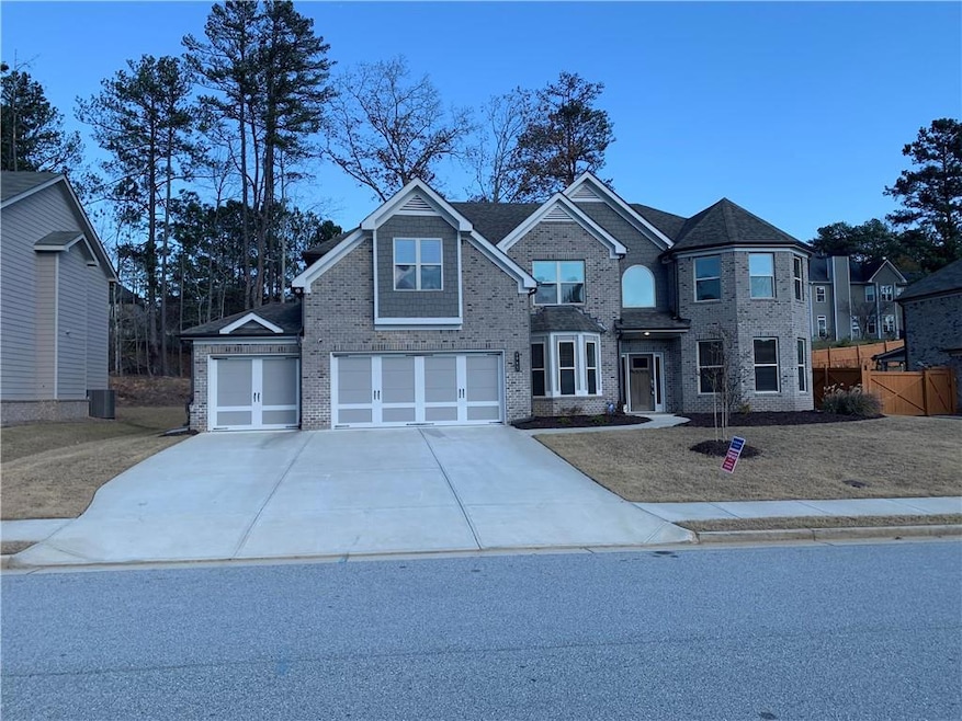 View of front of property featuring a front lawn