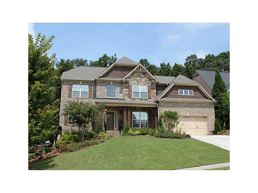 Exterior Front. Fabulous 4 sided Brick Home in Gat