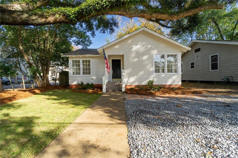 View of front of house with a front lawn