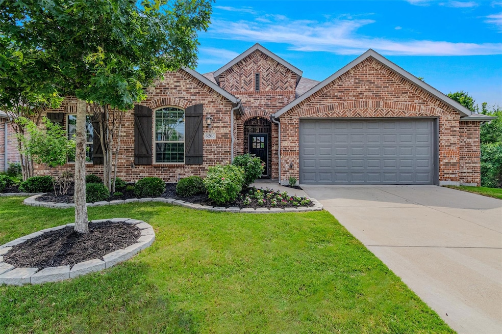 Impressive landscaping and drive up to greet family and friends.
